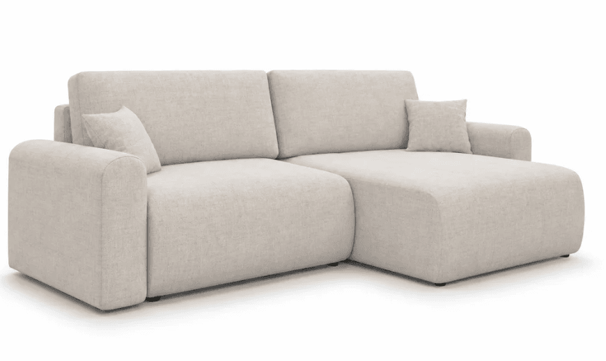 A light beige, two-piece contemporary sectional sofa featuring a right-hand facing chaise lounge and plush fabric upholstery. The design incorporates rounded, thick arms and backrests, giving it a soft, inviting aesthetic. It is presented against a plain white background, suggesting a rendered image or a studio photograph. — 3D model