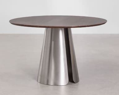 A modern round dining table featuring a dark wood top and a unique conical pedestal base made of brushed metal. The base has a split design, adding a distinctive architectural element. — 3D model