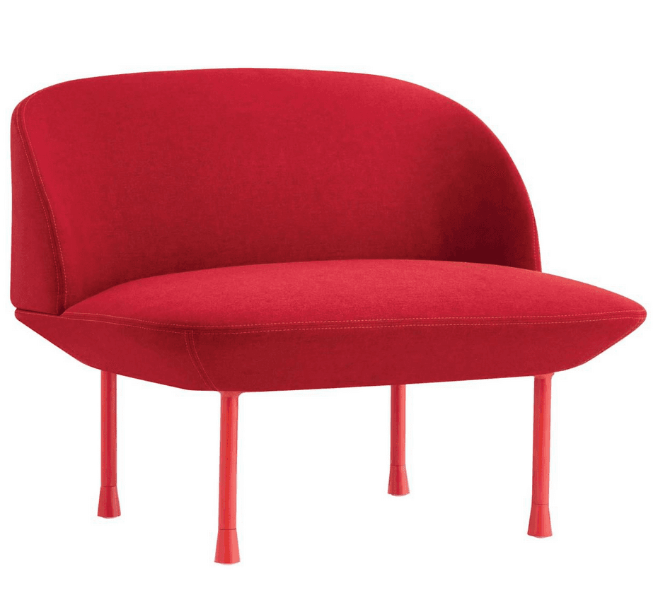 A contemporary armchair with a curved, upholstered back and seat. It features four slender, tapered legs that extend from the base. The armchair is covered in a textured red fabric. — 3D model