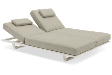 A contemporary dual chaise lounge featuring two independently adjustable backrests, each with a small head pillow. It is supported by a sleek white metal frame and upholstered in a light greige textured outdoor fabric. — 3D model