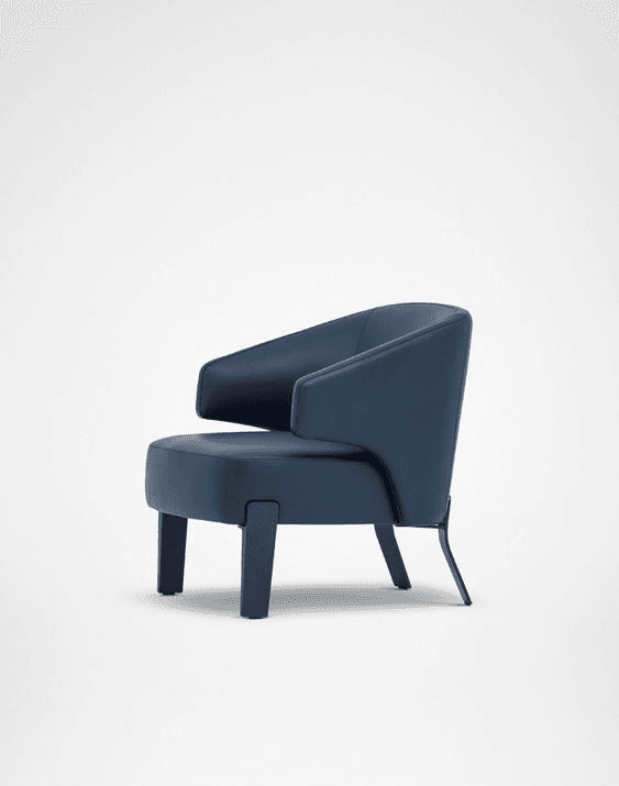 A contemporary armchair featuring a compact, rounded form and upholstered in a deep blue material. It has integrated armrests and a gently curved back, supported by distinctive dark-toned legs where the front legs are L-shaped and the rear legs are slender and angled. — 3D model