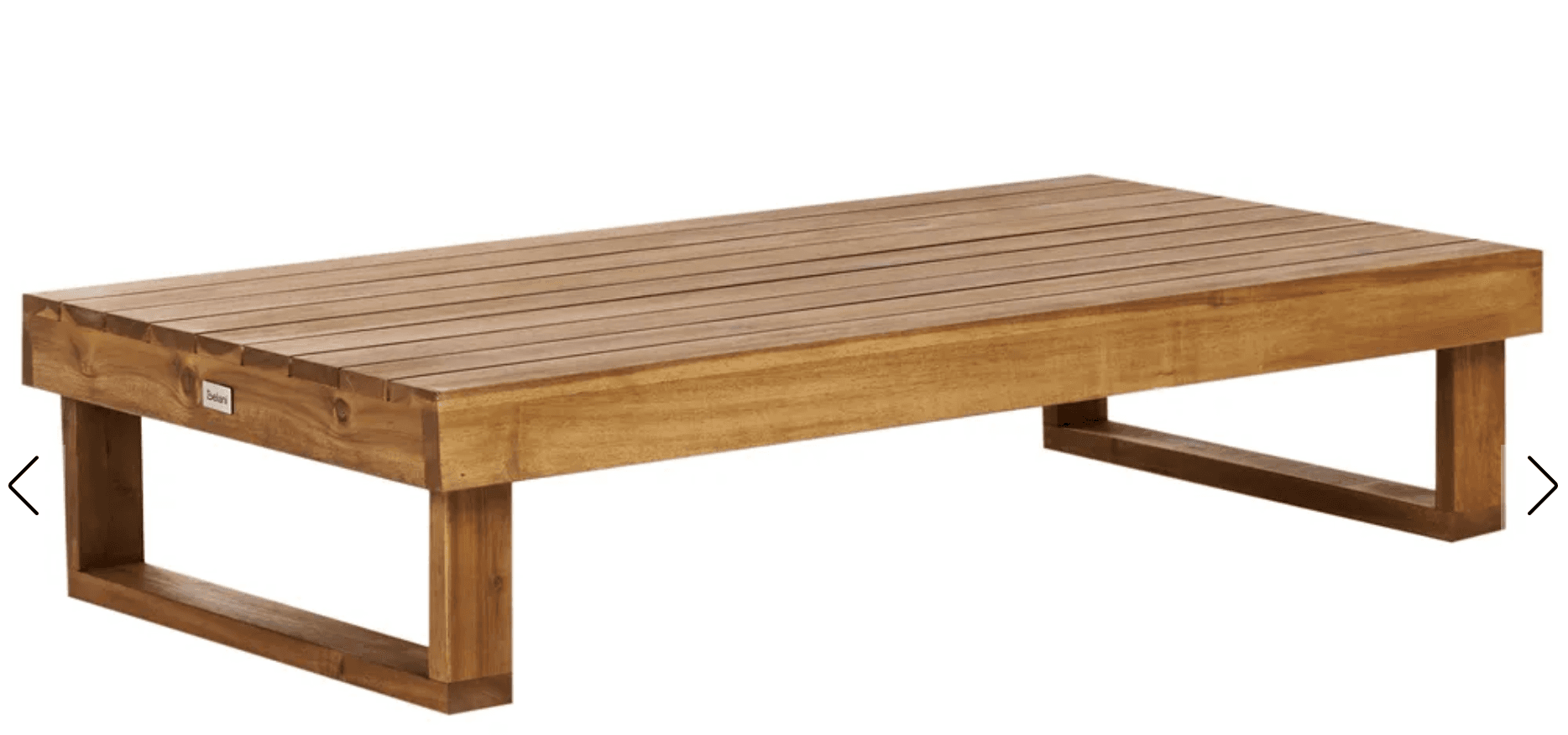 A rectangular coffee table with a slatted wooden top and a minimalist frame. The table features a low profile with two sturdy, angular legs on each side, connected by a horizontal support. The wood grain is visible, suggesting a natural finish. A small white label is present on the left side of the table. — 3D model