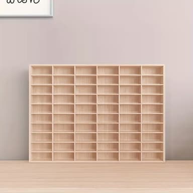 A light wood modular storage unit featuring 35 open square cubby compartments arranged in a 7x5 grid. — 3D model