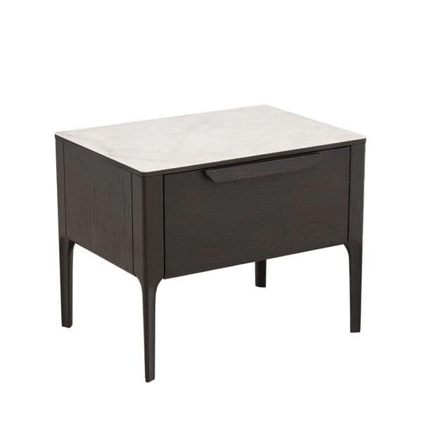 A modern nightstand featuring a dark wood veneer construction with a smooth, integrated drawer. The unit is topped with a sleek marble surface, providing a luxurious contrast. It stands on four tapered legs that angle outward, contributing to its contemporary silhouette. The drawer face is minimalist, with a subtle, recessed handle integrated into its upper edge. — 3D model