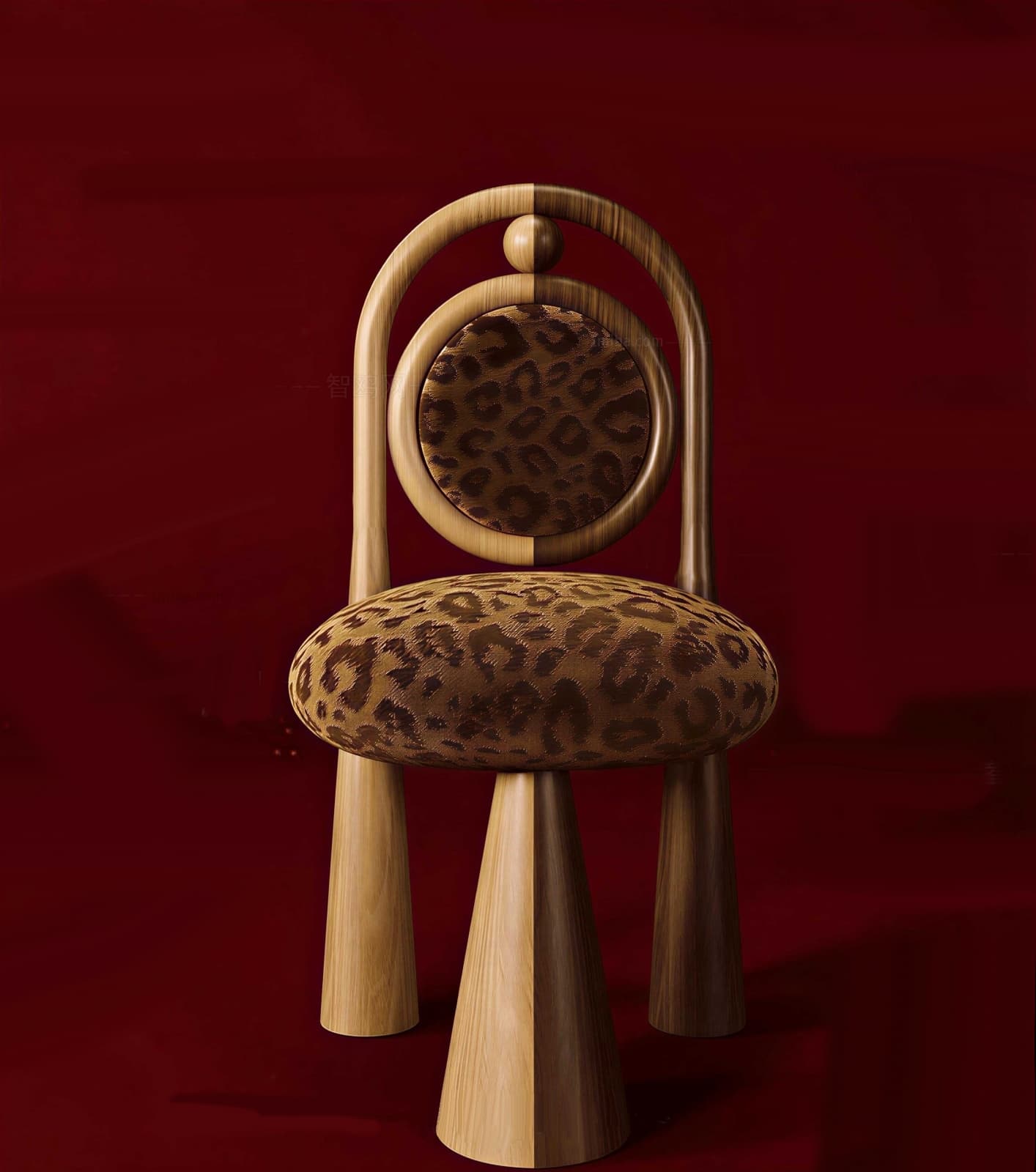 A contemporary accent chair featuring a light wood frame, a round padded backrest, and a matching round padded seat, both upholstered in a distinctive brown leopard print fabric. The chair is supported by three thick, conical tapered legs made of the same light wood, with a unique curved back frame that forms a partial arch around the circular backrest, culminating in a small spherical detail at the top center. — 3D model