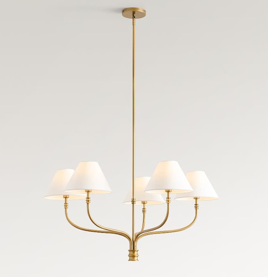 A brass chandelier with five arms, each supporting a white conical lampshade. The central stem extends from a ceiling-mounted canopy, and the arms branch out symmetrically. The overall design appears to be modern with classical influences. — 3D model
