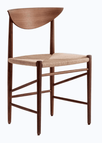 A wooden dining chair with a curved wooden backrest and a woven seat. The chair has four tapered legs connected by stretchers for stability. The overall design suggests a Mid-Century Modern or Scandinavian influence. — 3D model