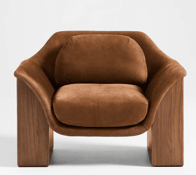 A modern armchair featuring a sculptural form, constructed from solid wood paneling and soft upholstered cushions. The chair exhibits a unique design where the upholstered seating surface, backrest, and integrated armrests form a continuous, curved U-shape, appearing to float within a sturdy, vertical walnut wood panel frame. — 3D model