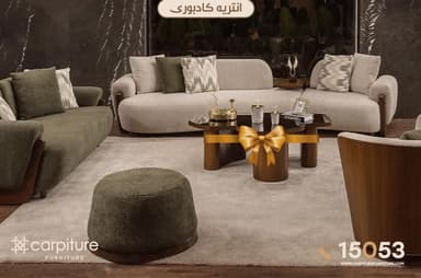 An octagonal coffee table with a dark brown tabletop and light-colored wooden legs. The legs are angled outwards for stability. The design appears to be modern or mid-century. — 3D model
