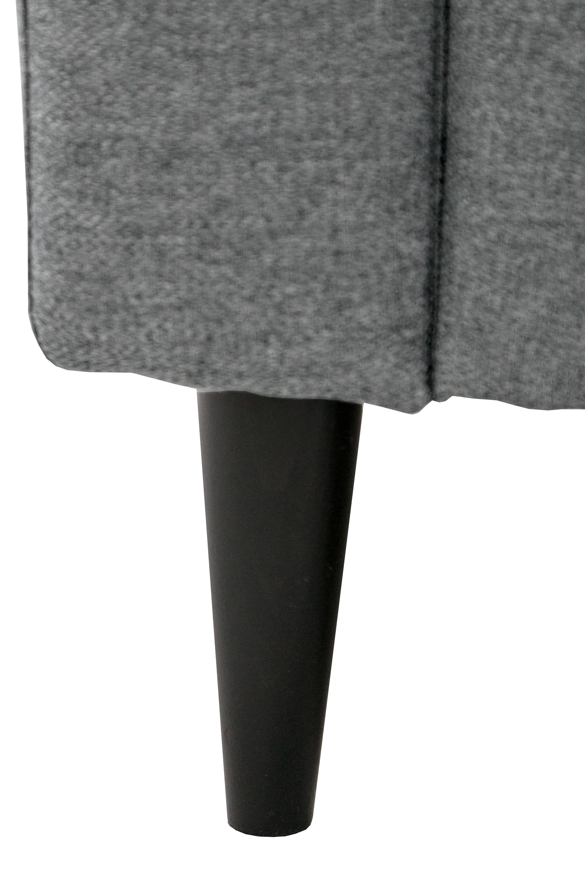 A close-up view of a grey upholstered furniture piece, featuring a vertically ribbed or seamed textile surface and a single black, tapered leg visible below. The fabric appears to be a textured, possibly woven, material, indicating a modern or contemporary design. — 3D model