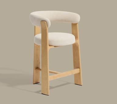 A bar-height or counter-height stool featuring a light-colored wooden frame with horizontal stretchers serving as footrests, and a fully upholstered, U-shaped yellow cushion forming both the seat and the integrated backrest and armrests. — 3D model