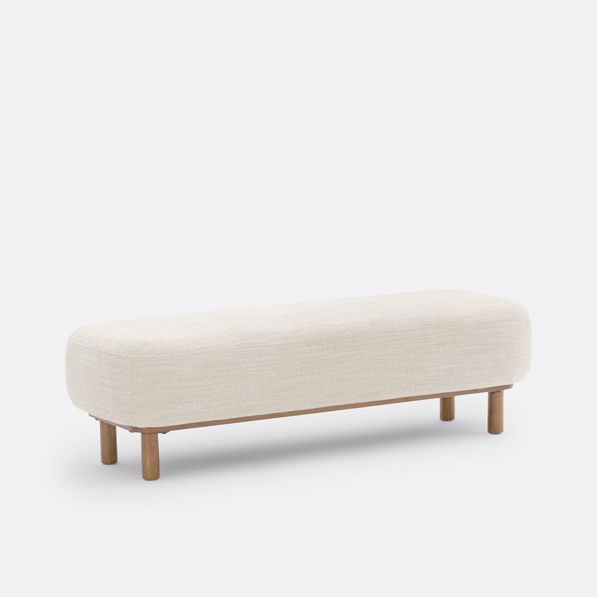 A modern upholstered bench featuring a long, rounded rectangular cushion in a light beige, textured fabric, supported by an exposed natural wood frame and four cylindrical wooden legs. — 3D model