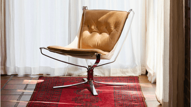A mid-century modern lounge chair with a bentwood frame and upholstered seat and back. The frame consists of curved wooden elements forming the legs and arms, with a central pedestal base. The seat and back are made of a brown fabric or leather, with visible cushioning. — 3D model