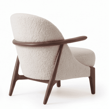 A contemporary armchair featuring an exposed dark wood frame with a curved backrest and integrated armrests. The seat and back are generously upholstered in a cream or off-white boucle fabric, providing a textured and plush appearance. The legs are tapered and splayed, contributing to an elegant and lightweight silhouette. — 3D model