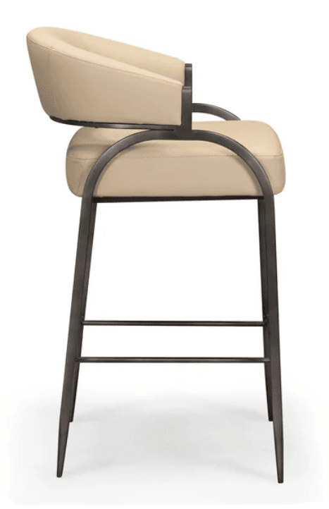 A contemporary bar stool featuring a beige upholstered seat and backrest with integrated armrests, set on a dark bronze or grey metal frame. The stool includes footrest bars for comfort and appears to have a swivel mechanism. The design is sleek and minimalist. — 3D model