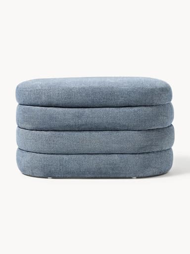 A stack of four upholstered ottomans, each with a rounded rectangular shape and a textile covering. The ottomans appear to be designed for stacking or as individual seating units. — 3D model