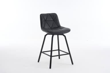 A black bar stool with a geometrically quilted faux leather seat and a black metal splayed-leg base with an integrated footrest. — 3D model