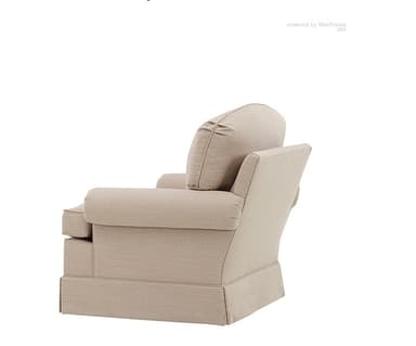 A traditional upholstered armchair featuring a classic silhouette. It has rolled arms, a rounded backrest, and a loose seat cushion. The base is covered with a tailored skirt, giving it a soft and cohesive appearance. The chair is upholstered in a light, neutral-toned woven fabric. — 3D model