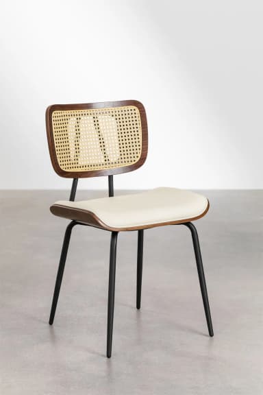 A contemporary dining chair featuring a curved dark wood frame with a woven cane backrest, an upholstered off-white seat, and slender black metal legs. — 3D model