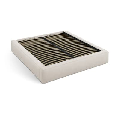 A minimalist, upholstered platform bed frame featuring a light beige, textured fabric. The frame has a low profile, with clean, straight lines, and does not include a headboard or footboard. The interior reveals a wooden slatted base system designed to support a mattress directly, negating the need for a box spring. The design emphasizes simplicity and a contemporary aesthetic. — 3D model