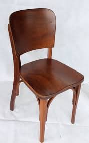 A wooden chair with a curved backrest and a padded seat. The chair has four legs and appears to be of vintage design. The wood is stained a dark brown, and the seat is upholstered in a dark fabric. — 3D model