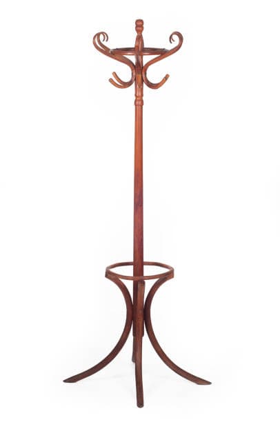 A freestanding wooden coat rack with a central pole, a flared top with multiple hooks for hanging garments, and a tiered base with curved legs. It features an integrated circular element near the base, possibly for holding umbrellas. — 3D model