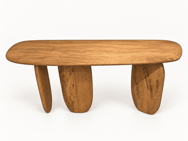 An organic modern console table with an elongated, surfboard-shaped top and three substantial, irregularly shaped legs, all crafted from solid light brown wood with prominent grain. — 3D model