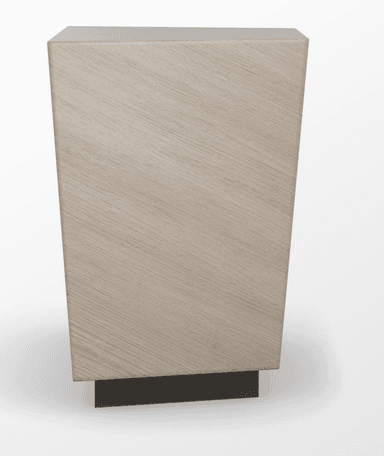 A modern cabinet with a trapezoidal body, wider at the top and narrowing towards the bottom. It stands on a dark, rectangular base. The main body features a light-colored wood veneer with a linear, diagonal grain pattern. The top surface appears to be a solid, lighter color, possibly a contrasting wood or laminate. The design is minimalist and contemporary. — 3D model