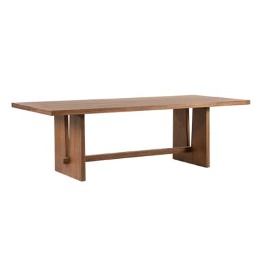 A rectangular dining table constructed from solid wood, featuring a prominent trestle base design. The tabletop is composed of multiple wood planks, exhibiting a natural grain pattern. The base consists of two substantial block-like supports, each with a wide, flat profile, connected by a horizontal stretcher bar. The overall finish is a medium brown, showcasing the wood's inherent texture and color. The design conveys a blend of contemporary and rustic aesthetics. — 3D model