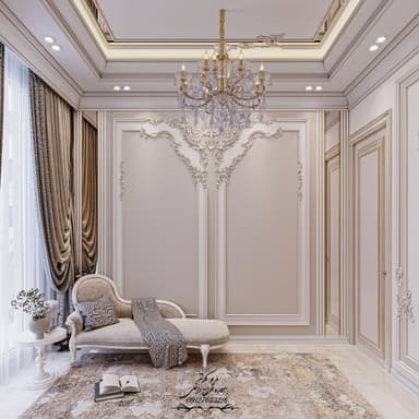 An elegant French Provincial style chaise lounge upholstered in light beige fabric, featuring a rolled backrest, carved wooden trim, and cabriole legs. It is accompanied by a small white pedestal table with a vase of dried flowers, a decorative patterned cushion, a throw blanket, and two books. — 3D model