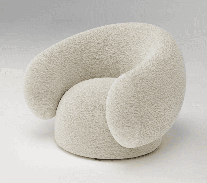 A modern, sculptural armchair upholstered in light-colored boucle fabric. It features a continuous, rounded form that integrates the back and arms, creating an enveloping seat. The chair rests on a recessed circular base, suggesting a swivel mechanism. — 3D model