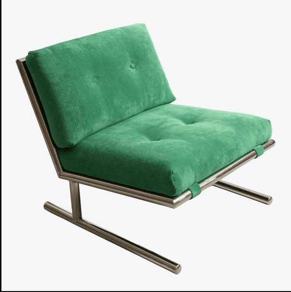 A low-slung, armless lounge chair featuring a polished steel frame and plush, button-tufted green corduroy cushions for the seat and back. — 3D model