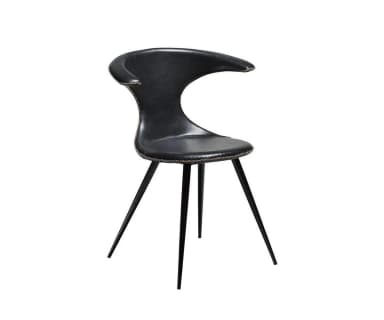 A modern black chair featuring a uniquely sculptural seat and backrest upholstered in what appears to be leather or faux leather with prominent contrasting white stitching. The backrest flares out at the top and narrows significantly at the waist before widening again for the seat. It is supported by four slender, angled black metal legs. — 3D model