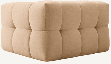 A contemporary, single-seater armchair featuring a distinct block-style silhouette, upholstered in a light beige textured fabric, designed for modern interiors. — 3D model