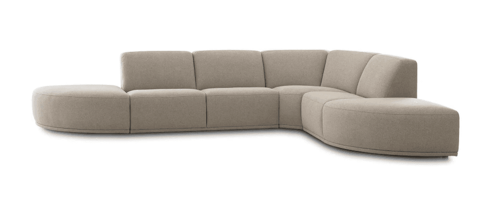 A large, modular sectional sofa upholstered in a light beige fabric. It features a contemporary design with rounded edges and a low profile. The configuration includes multiple seating modules forming an L-shape, with one end extending into a curved, armless chaise-like element. The backrests are integrated and slightly lower than conventional sofas, contributing to its sleek aesthetic. — 3D model