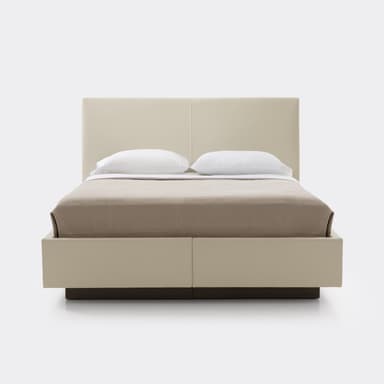 A modern upholstered platform bed with a padded headboard and a floating-effect base. — 3D model