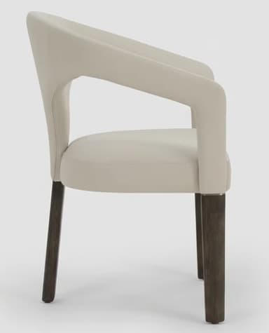 A contemporary armchair featuring a distinctive curved, upholstered backrest that flows seamlessly into integrated armrests. The seat is also upholstered, and the chair is supported by four dark, tapered wooden legs. The overall aesthetic is modern and sleek, with a neutral color palette. — 3D model