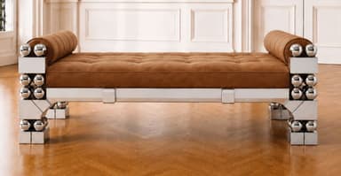 A striking postmodern daybed featuring a polished chrome frame with intricate geometric and spherical details, paired with a tufted, rich brown upholstered cushion and cylindrical bolster pillows at each end. The metallic frame consists of rectangular and triangular elements adorned with stacked chrome spheres, creating a bold and reflective aesthetic. — 3D model