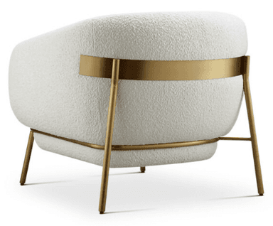 A contemporary lounge chair featuring a plush, rounded form upholstered in off-white boucle fabric, supported by a minimalist gold-toned metal frame. The frame includes slender legs and a distinctive horizontal band wrapping around the upper backrest. — 3D model