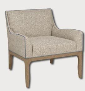 A fully upholstered armchair with a wooden base and four legs. The armchair features a high back and slightly flared arms. It is finished with a textured fabric and a contrasting piping detail along the edges. — 3D model