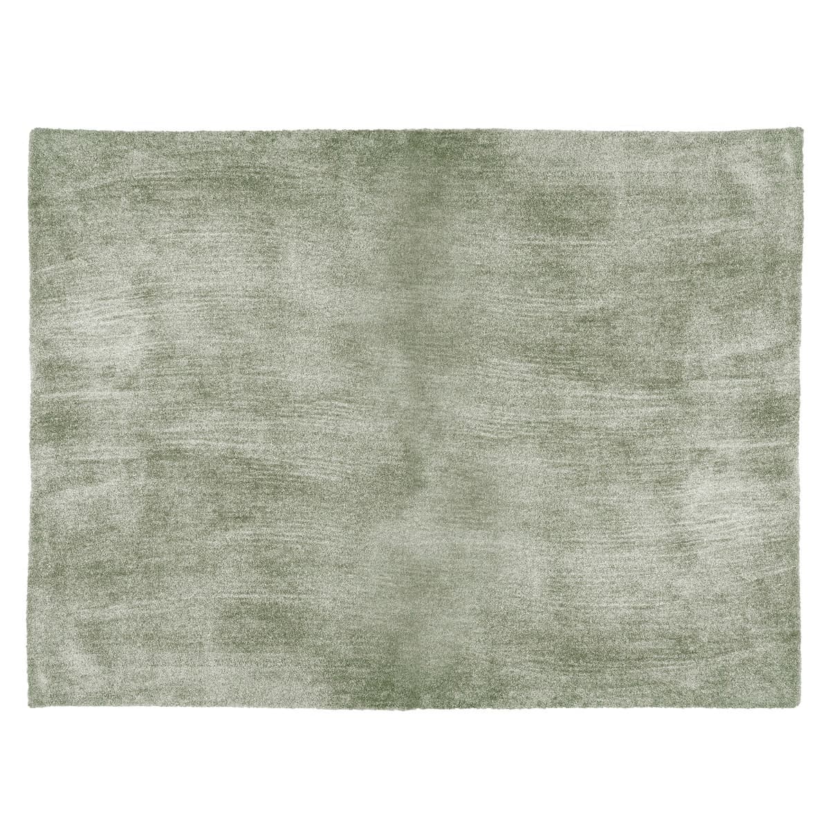 A rectangular rug with a dense, plush pile. The texture appears soft and somewhat irregular, with visible variations in pile direction and length that create a subtle, abstract pattern. The edges are finished with a simple binding. — 3D model