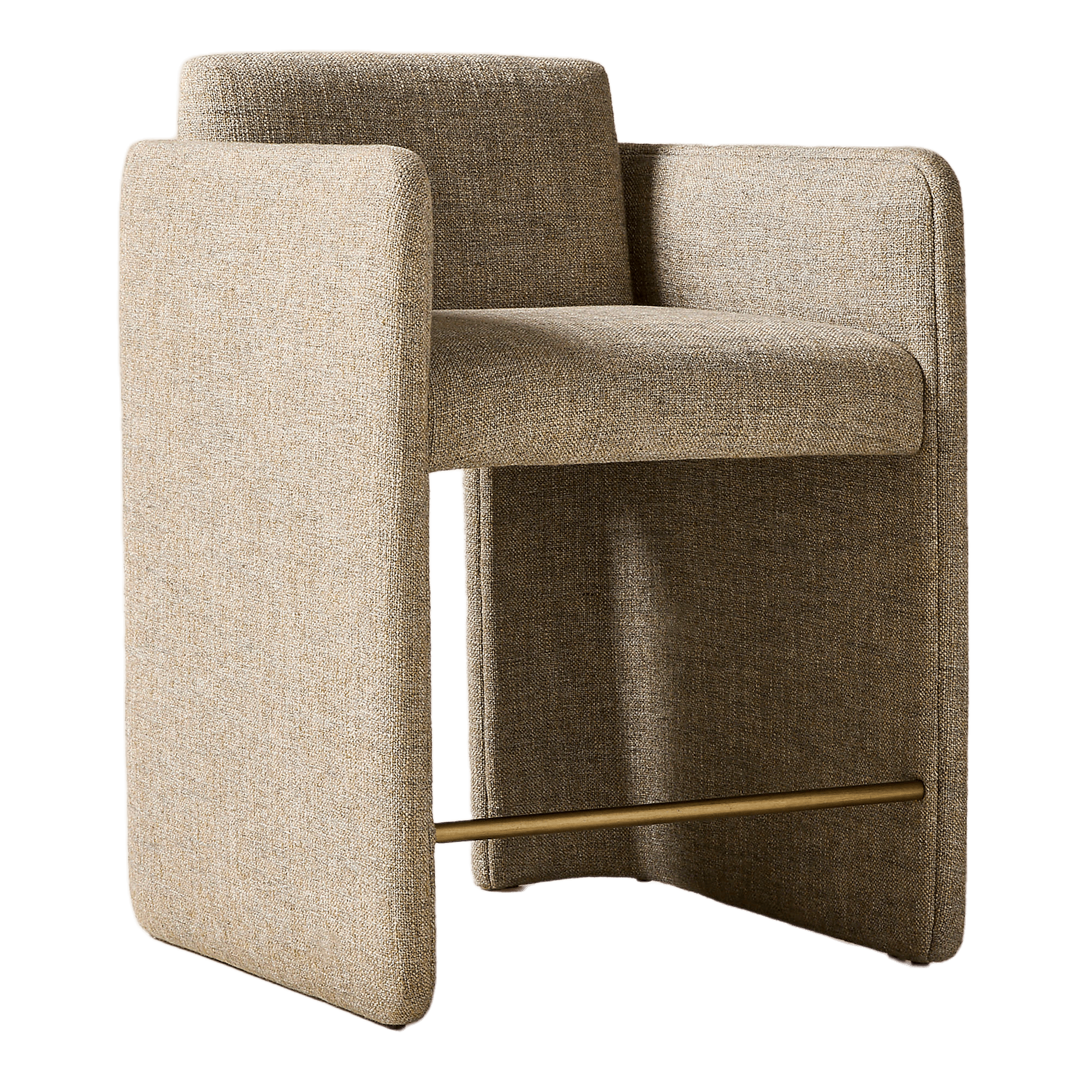 A contemporary armchair with a cubist-inspired design. It features a fully upholstered body with a textured, woven fabric in a neutral beige-brown hue. The armchair has high, straight armrests that extend down to form the sides of the base, creating a unified, solid form. A thin, cylindrical metal bar in a brass finish spans the width between the two side panels of the base, serving as a subtle structural element and footrest. The seat and back are well-padded, suggesting comfort. — 3D model
