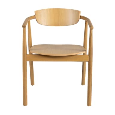 A light-colored wooden armchair with a curved backrest and armrests. The seat is a circular wooden panel. The legs are cylindrical and taper slightly towards the floor. The construction appears to be solid wood with visible grain patterns. The overall design is minimalist and contemporary. — 3D model