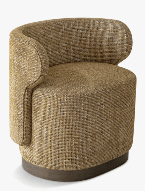 A contemporary armchair with a curved back and arms, upholstered in a textured woven fabric. It features a rounded, drum-like base constructed from a dark wood-like material. — 3D model