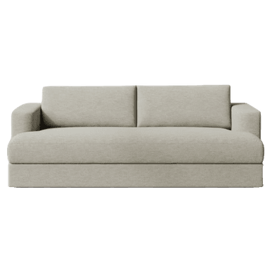 A cream-colored sofa seen from a rear three-quarter perspective. The sofa has a plush, upholstered design with two prominent back cushions. The base is a solid rectangular block, and the armrest on the visible left side is rounded and integrated into the main structure. The fabric appears to have a textured weave. — 3D model