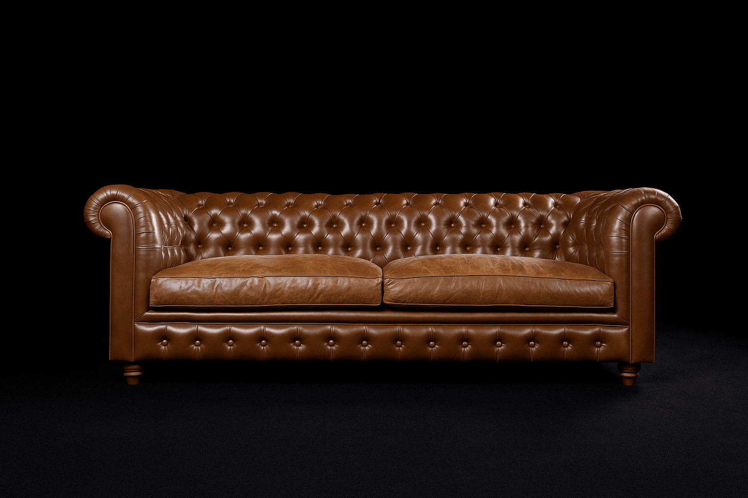 A classic Chesterfield sofa upholstered in rich cognac brown leather, featuring deep button tufting on the backrest, armrests, and front rail. It has distinct rolled arms and separate, plush seat cushions. The sofa sits on short, turned wooden feet, presenting a timeless and sophisticated aesthetic. — 3D model