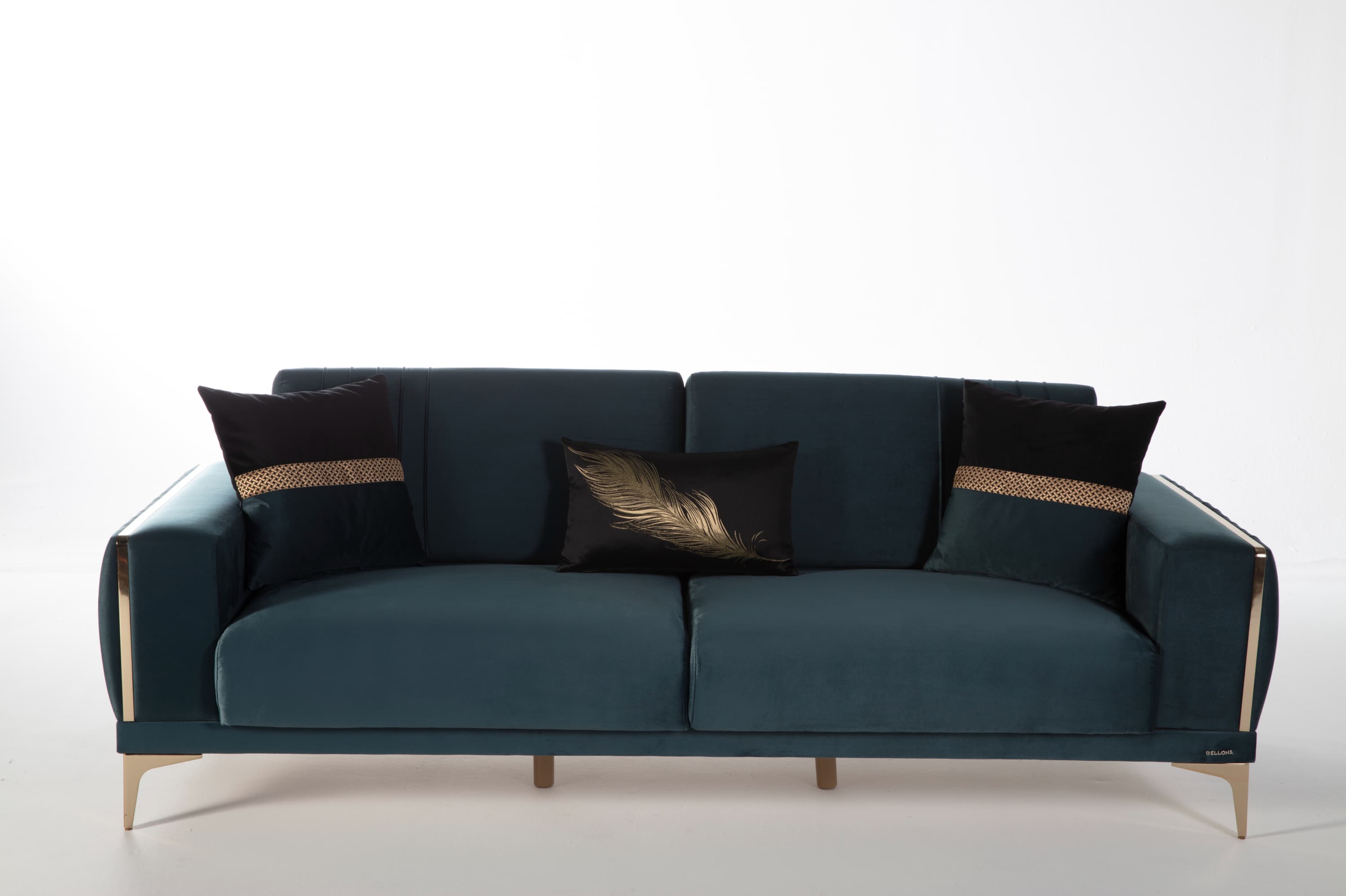 A modern, upholstered three-seater sofa in a deep teal velvet fabric. The sofa features a clean-lined design with plush seat and back cushions. It is adorned with decorative throw pillows: two black pillows with gold woven accents on the sides, and a central black pillow with a metallic gold feather motif. The sofa has subtle vertical tufting on the backrest and is supported by angled metallic gold legs, with thin gold trim accenting the outer edges of the arms and base. — 3D model