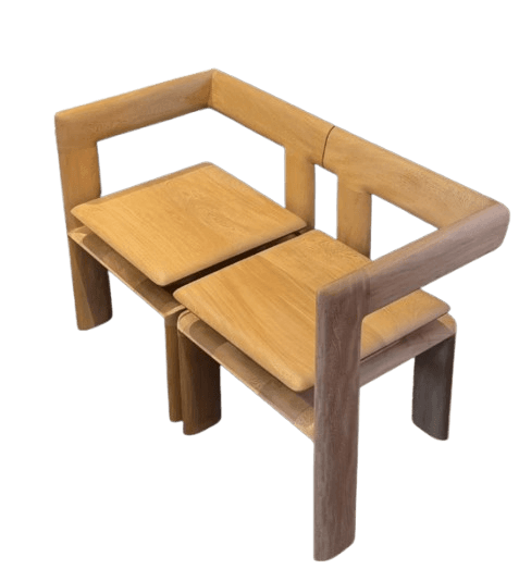 A modern minimalist loveseat constructed entirely from light-colored solid wood. It features a clean, rectilinear frame forming integrated back and armrests, with two individual, slightly curved wooden seat panels. — 3D model