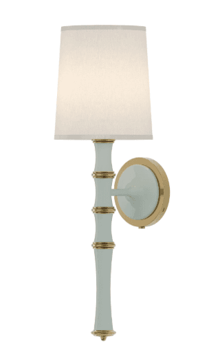 A wall-mounted light fixture featuring a tapered lampshade and a decorative stem designed to mimic bamboo segments. The stem is accented with polished brass-colored rings. — 3D model