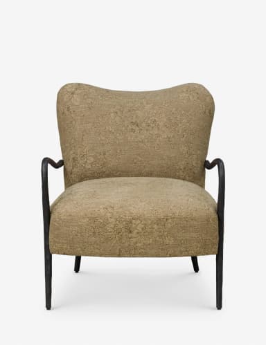 An upholstered accent armchair featuring a high, slightly curved backrest. The chair is covered in a textured fabric with a subtle floral or botanical pattern, in shades of beige, brown, and olive green. It has dark, tapered legs that splay slightly outwards. The armrests are partially visible from the side and appear integrated into the upholstered body. The design suggests a blend of classic comfort with mid-century modern leg styling. — 3D model